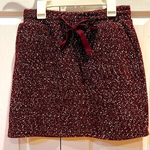 Tweed mini skirt w tie front detail in XS
